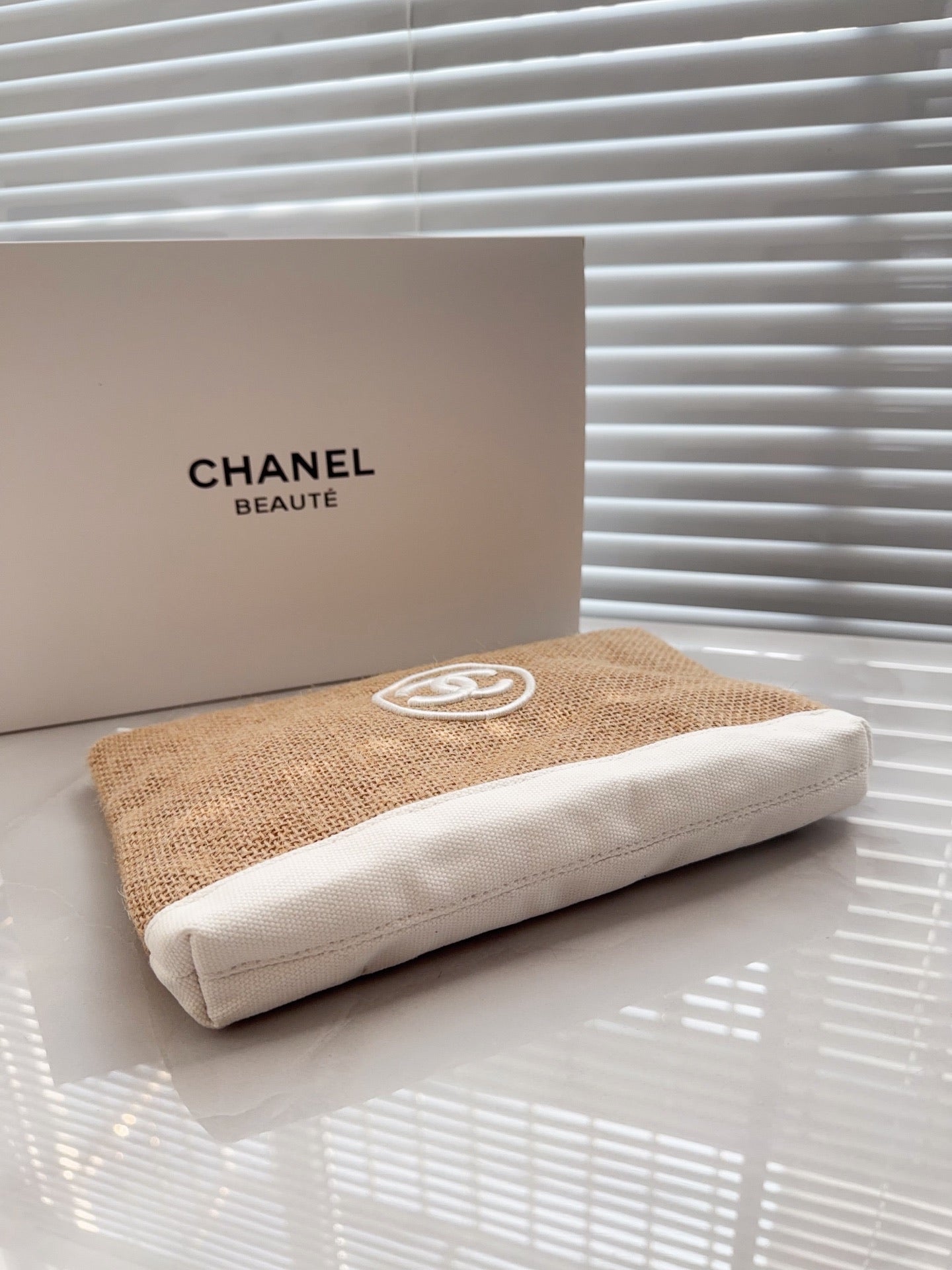Chanel rafia pouch