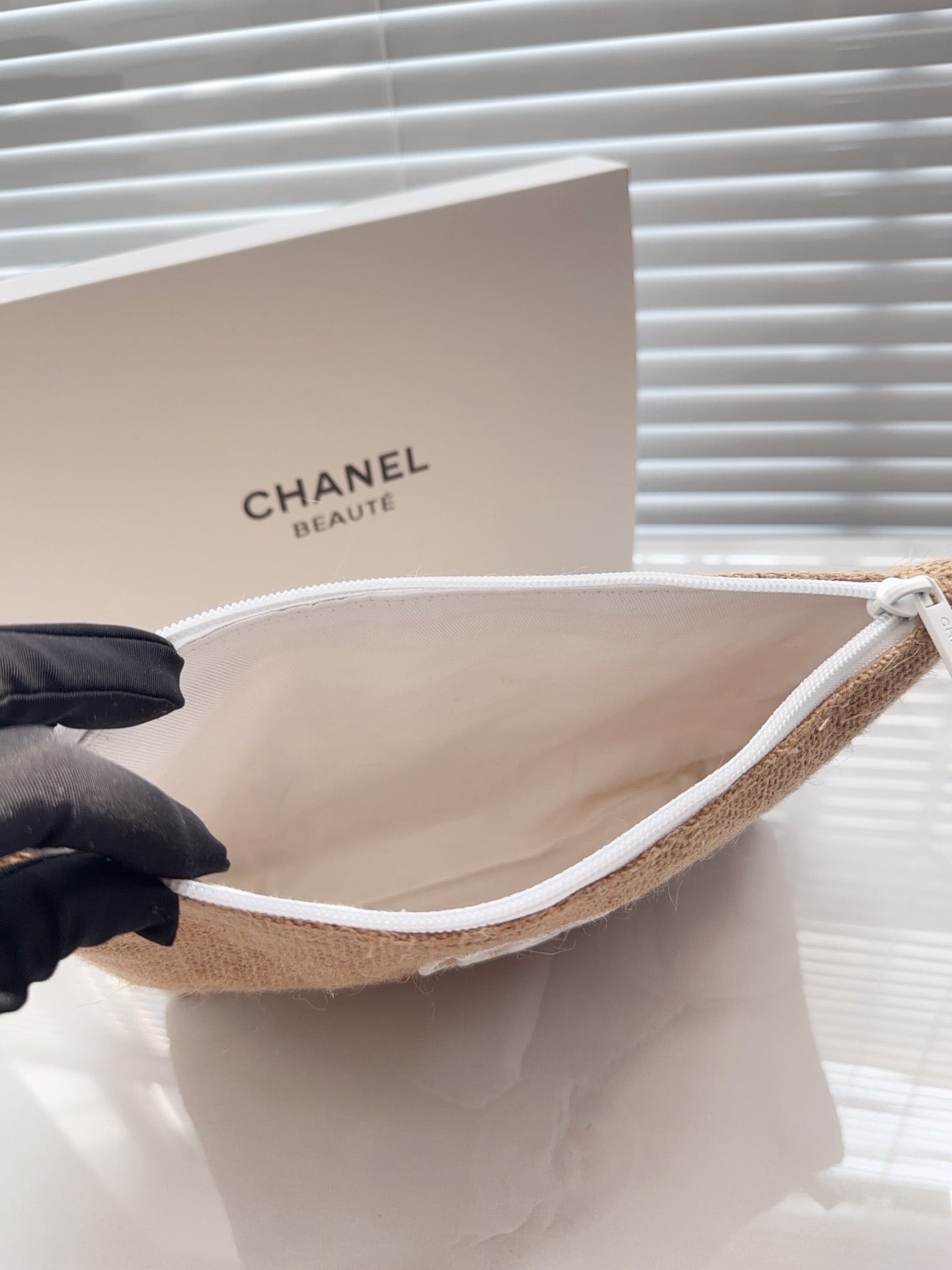 Chanel rafia pouch