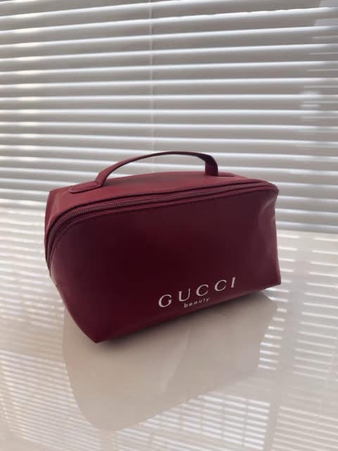 Gucci burgundy pouch