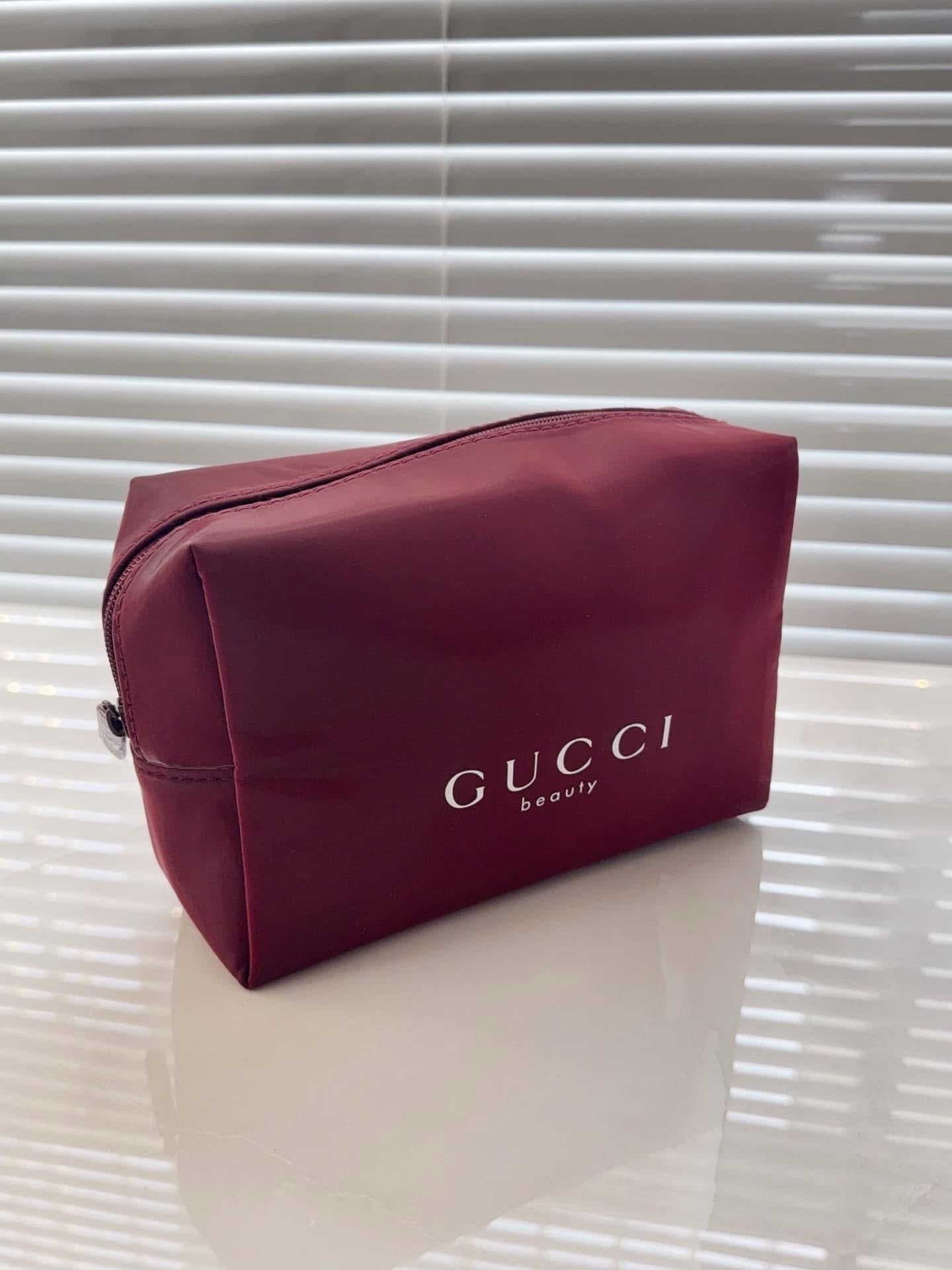 Gucci burgundy pouch
