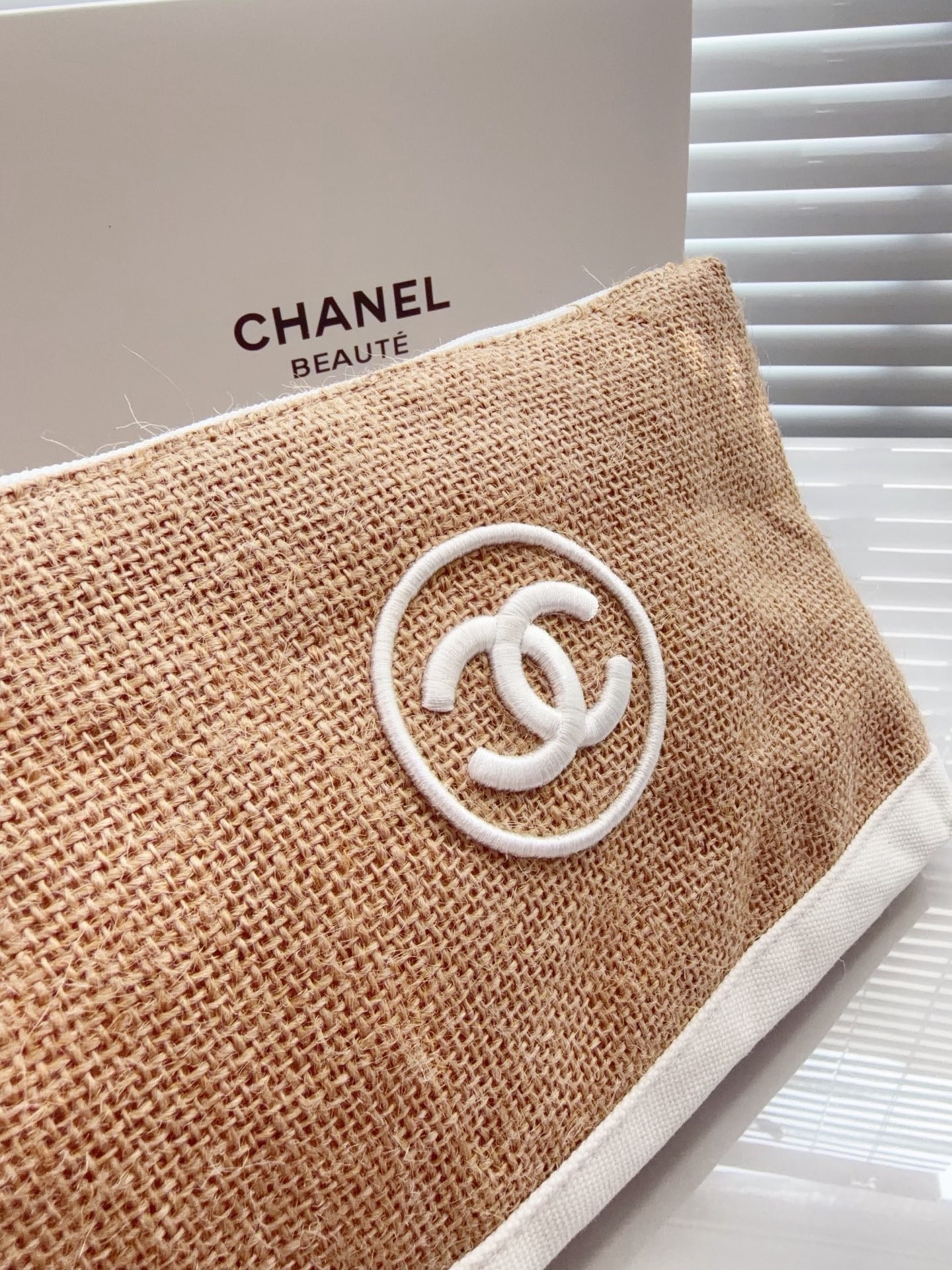 Chanel rafia pouch