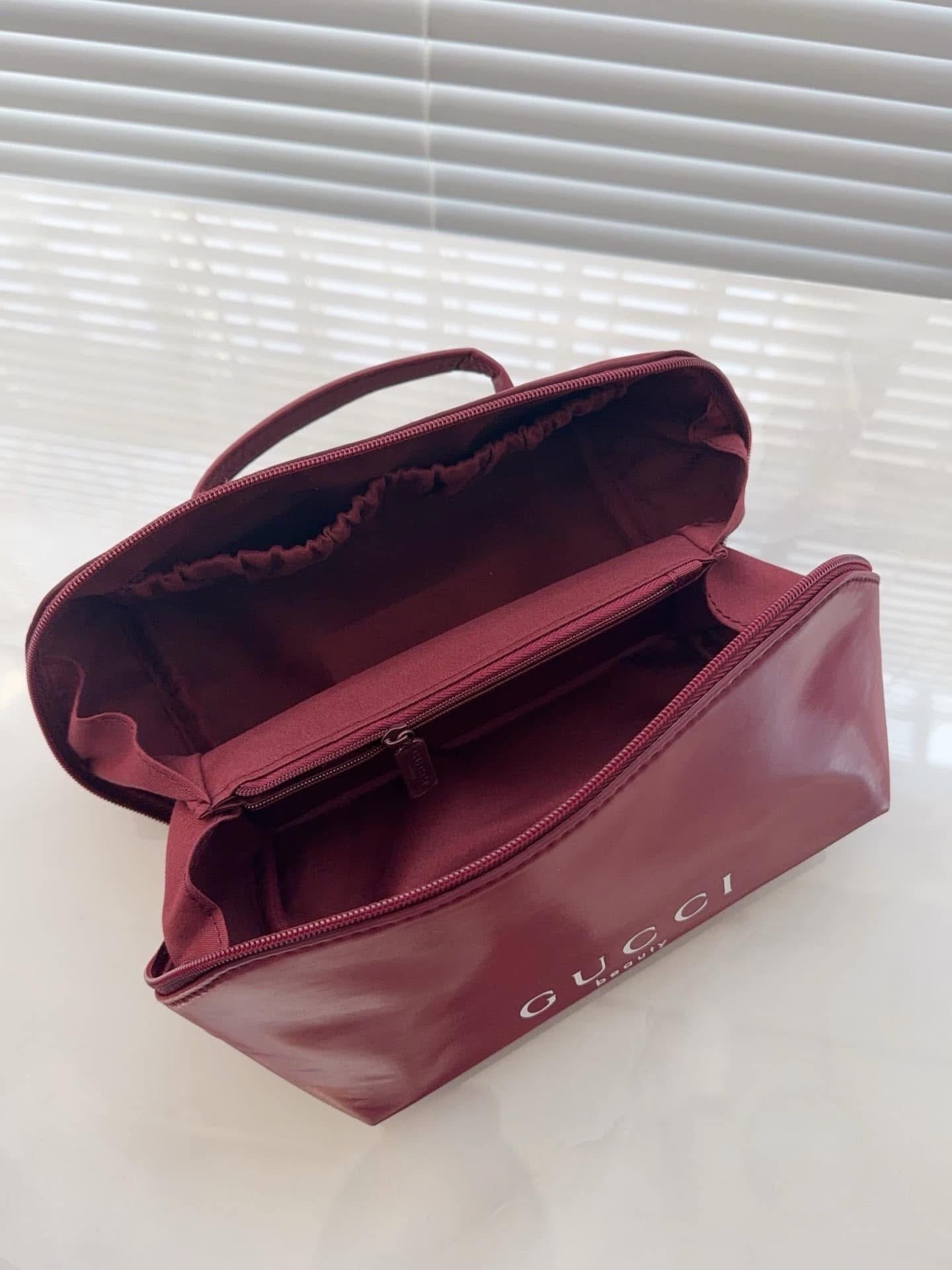 Gucci burgundy pouch