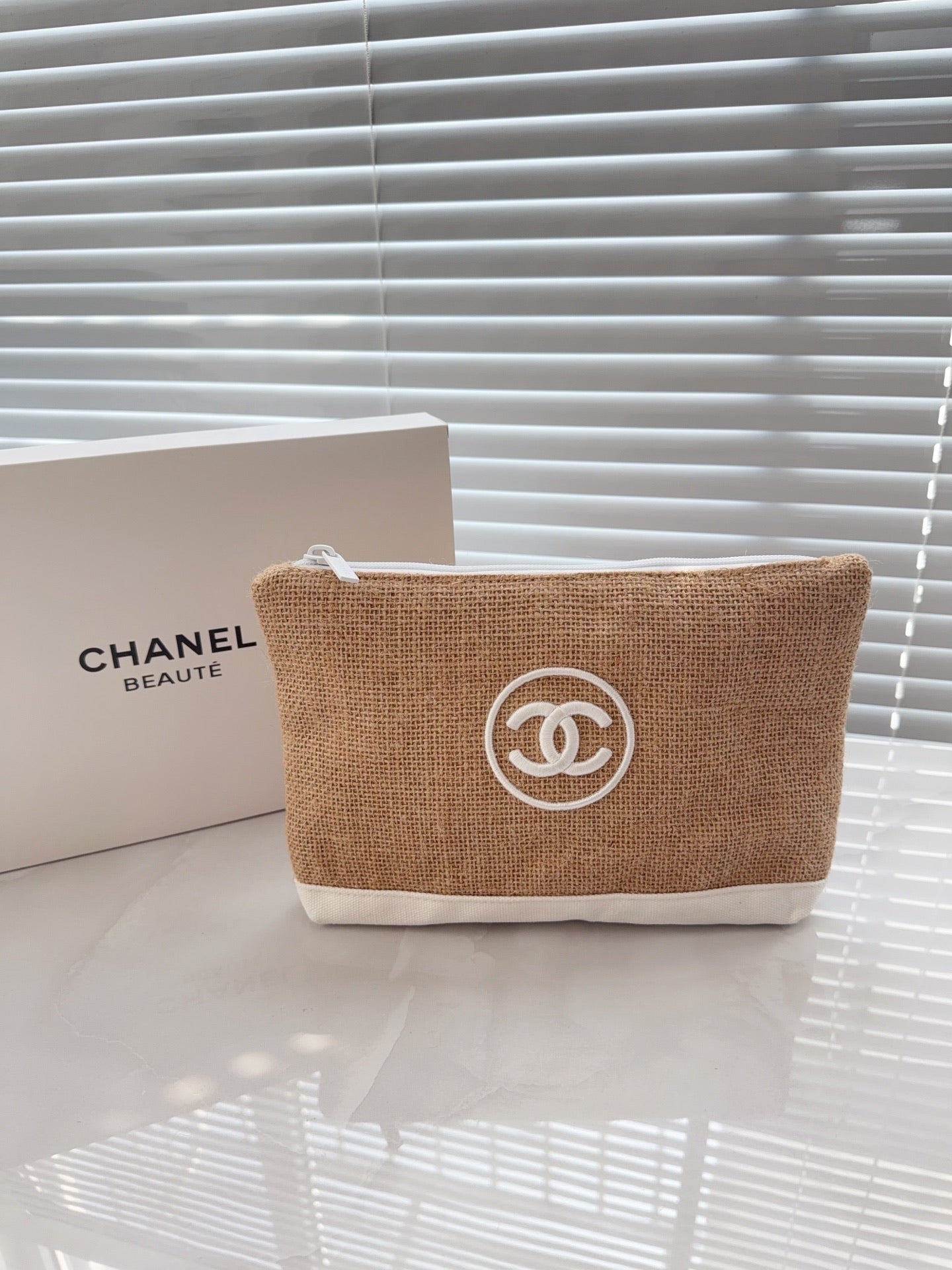 Chanel rafia pouch