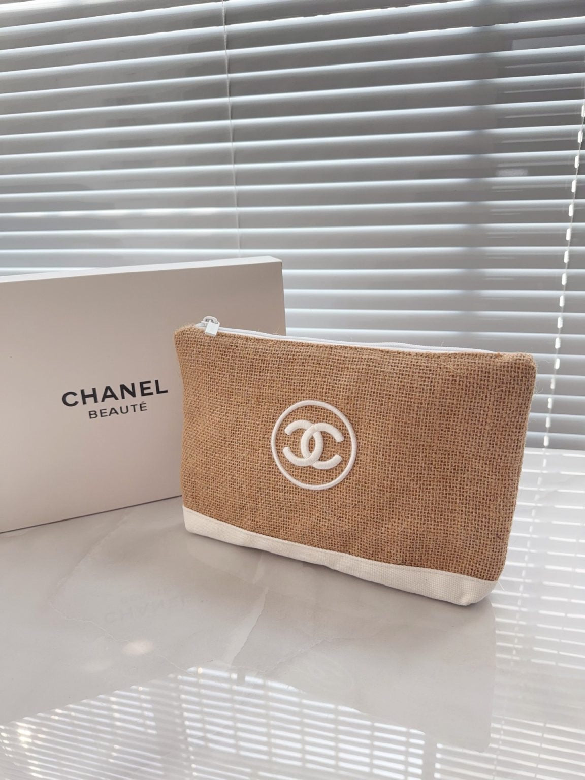 Chanel rafia pouch