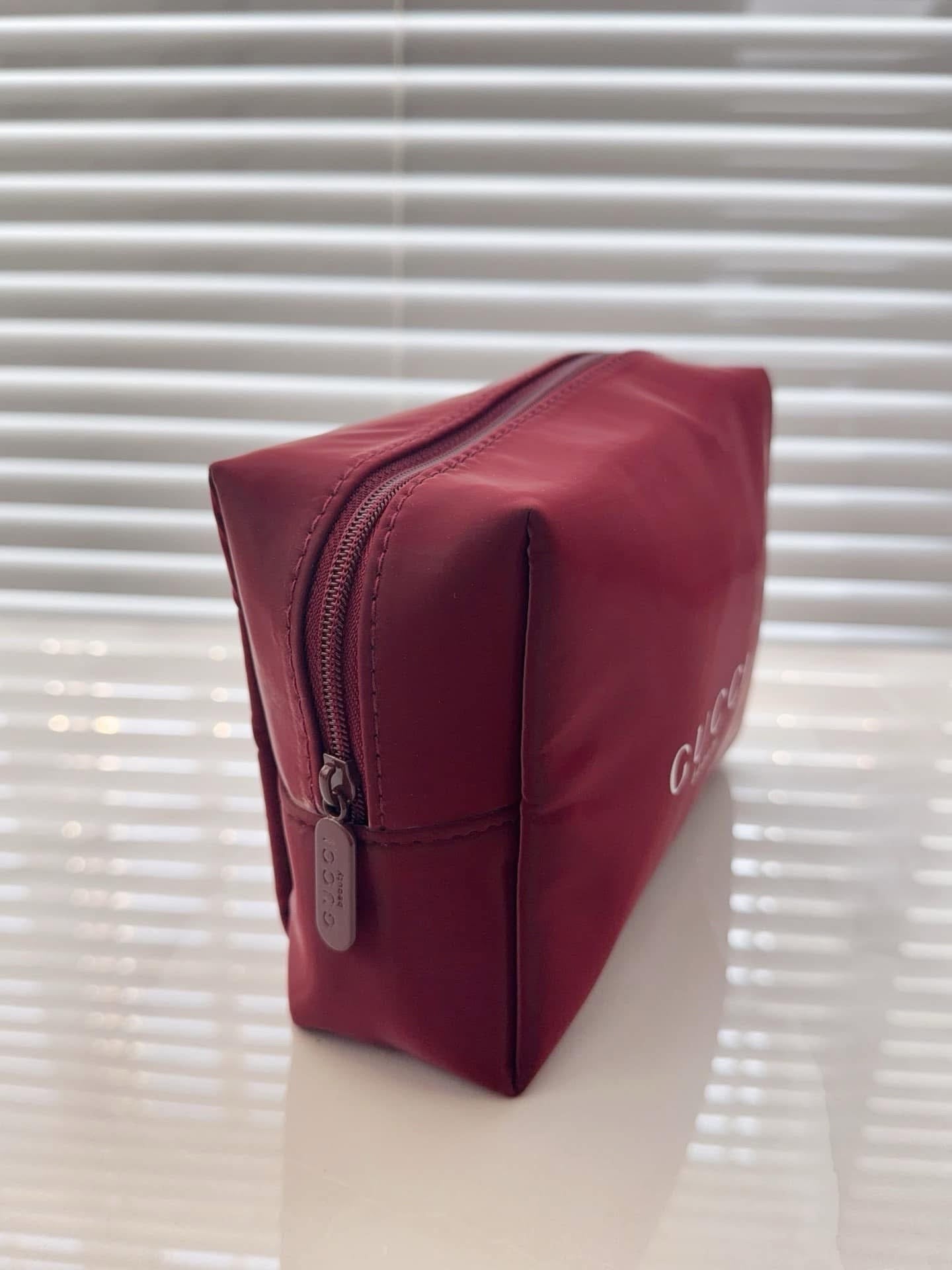 Gucci burgundy pouch