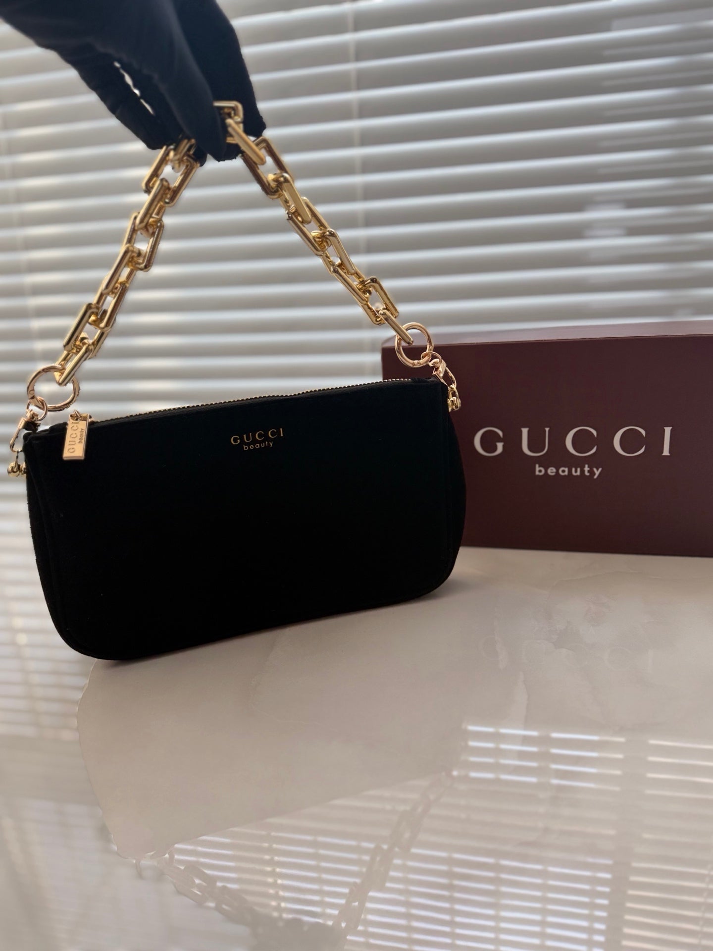 Gucci pouch with chain