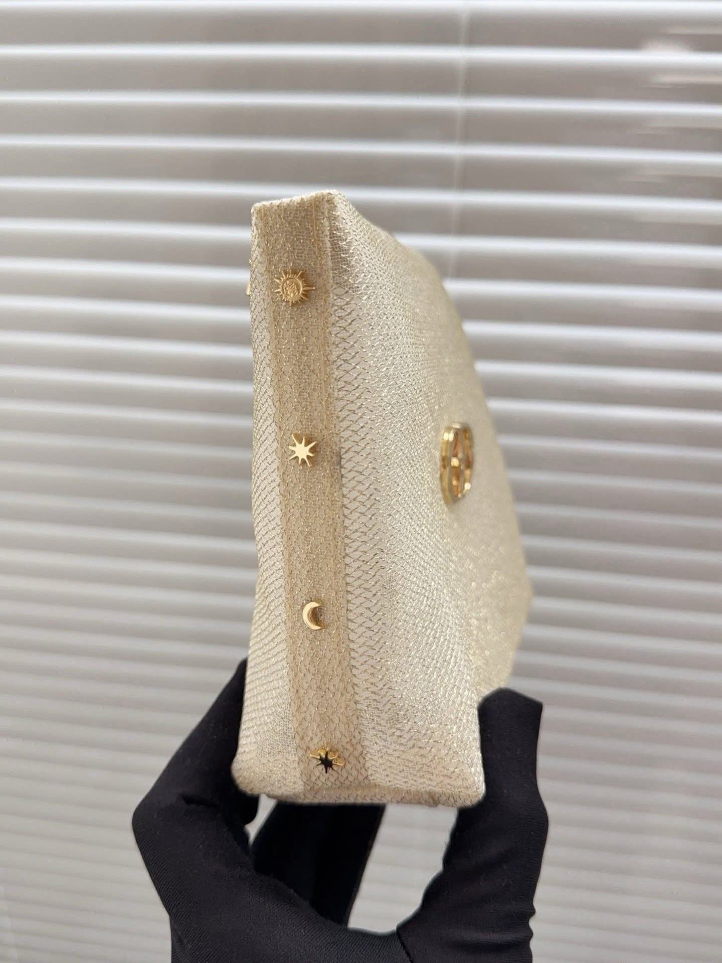 Dior Gold glitter mesh makeup bag
