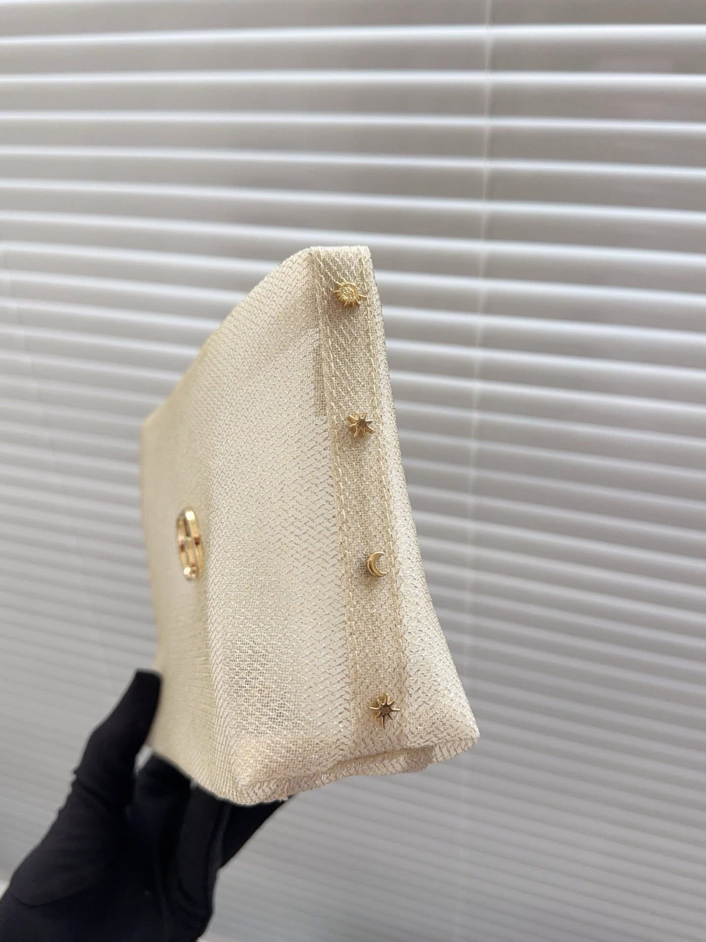 Dior Gold glitter mesh makeup bag