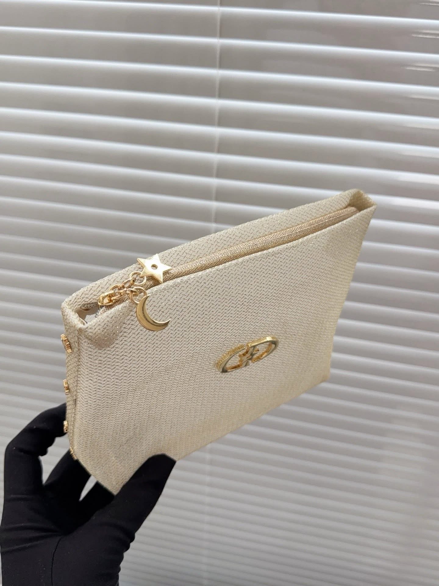 Dior Gold glitter mesh makeup bag