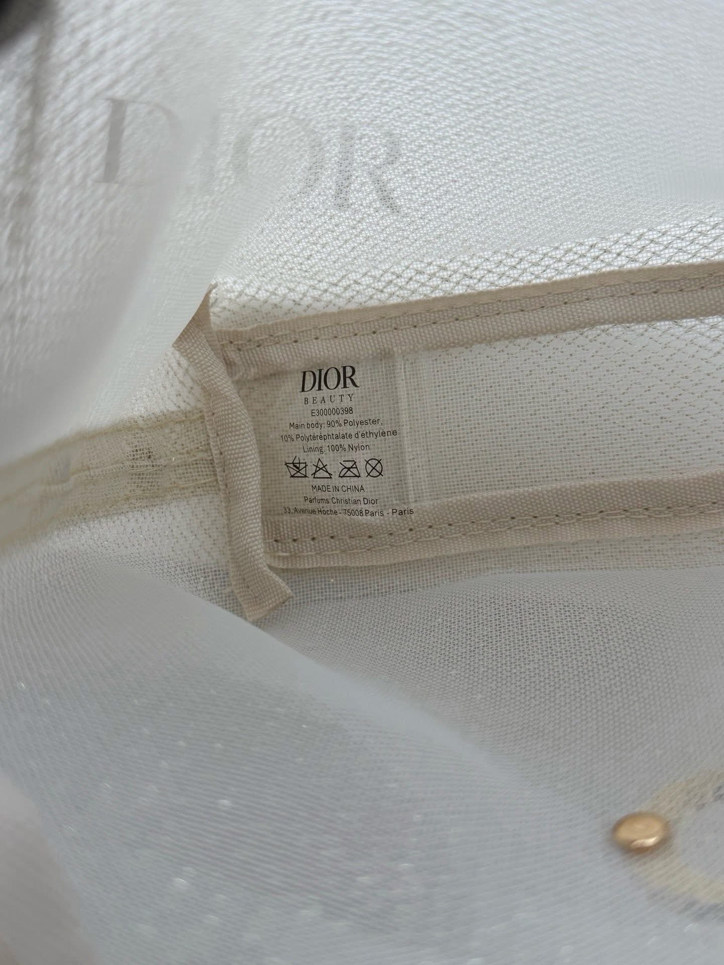 Dior Gold glitter mesh makeup bag